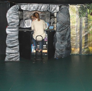 sitting at cave-desk